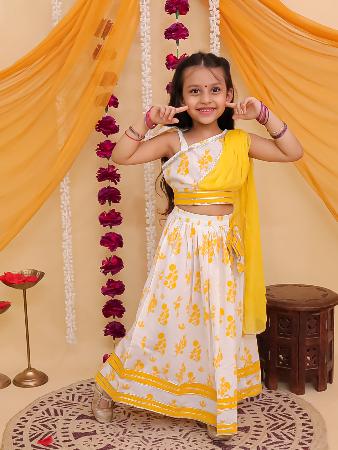 Girls Yellow Cotton Sleeveless Floral Printed Lehenga Choli with Latkan