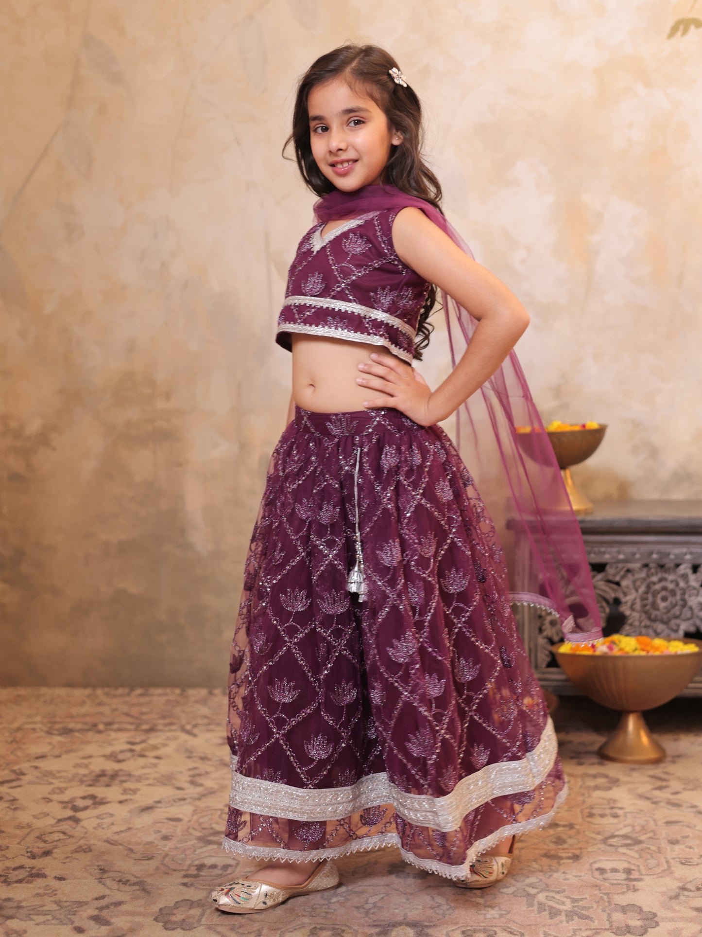 Girls Wine Net Sleeveless Heavy Embroidered Lehenga Choli