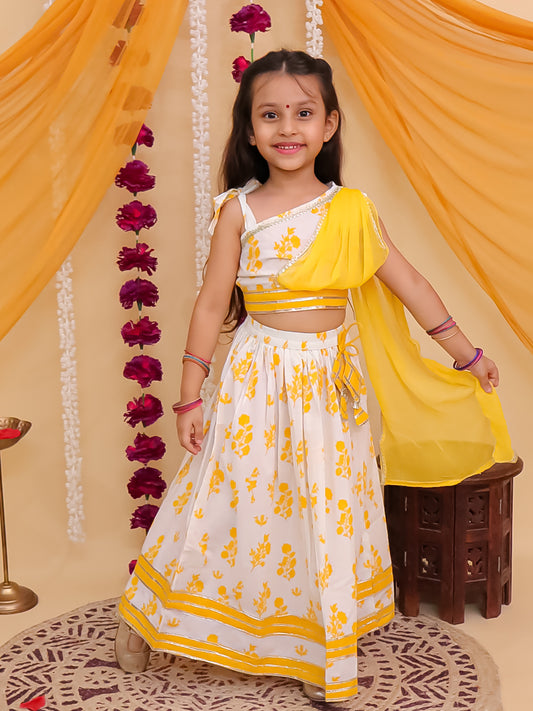 Girls Yellow Cotton Sleeveless Floral Printed Lehenga Choli with Latkan