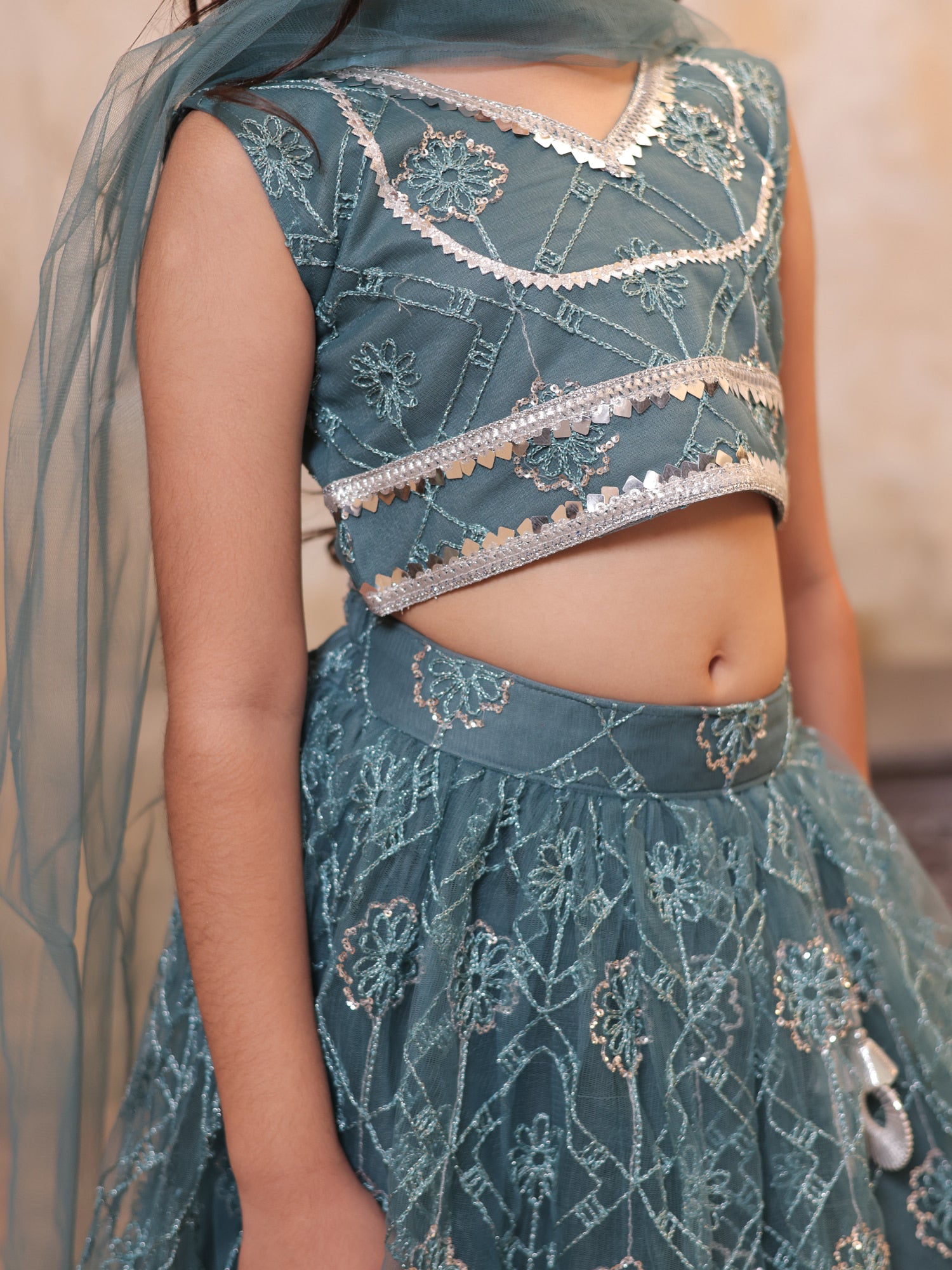 Girls Teal Net Sleeveless Heavy Embroidered Lehenga Choli