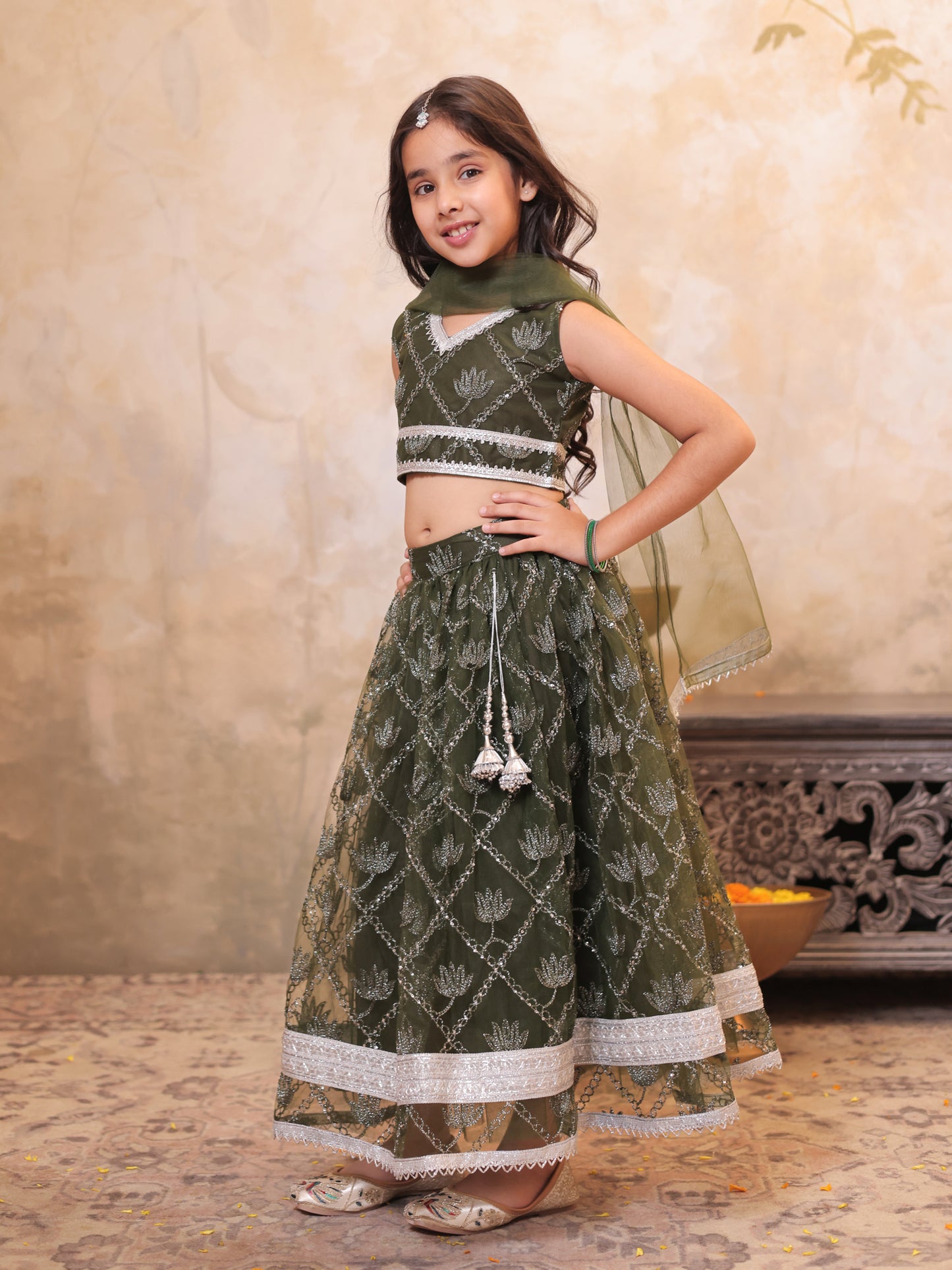 Girls Green Net Sleeveless Heavy Embroidered Lehenga Choli