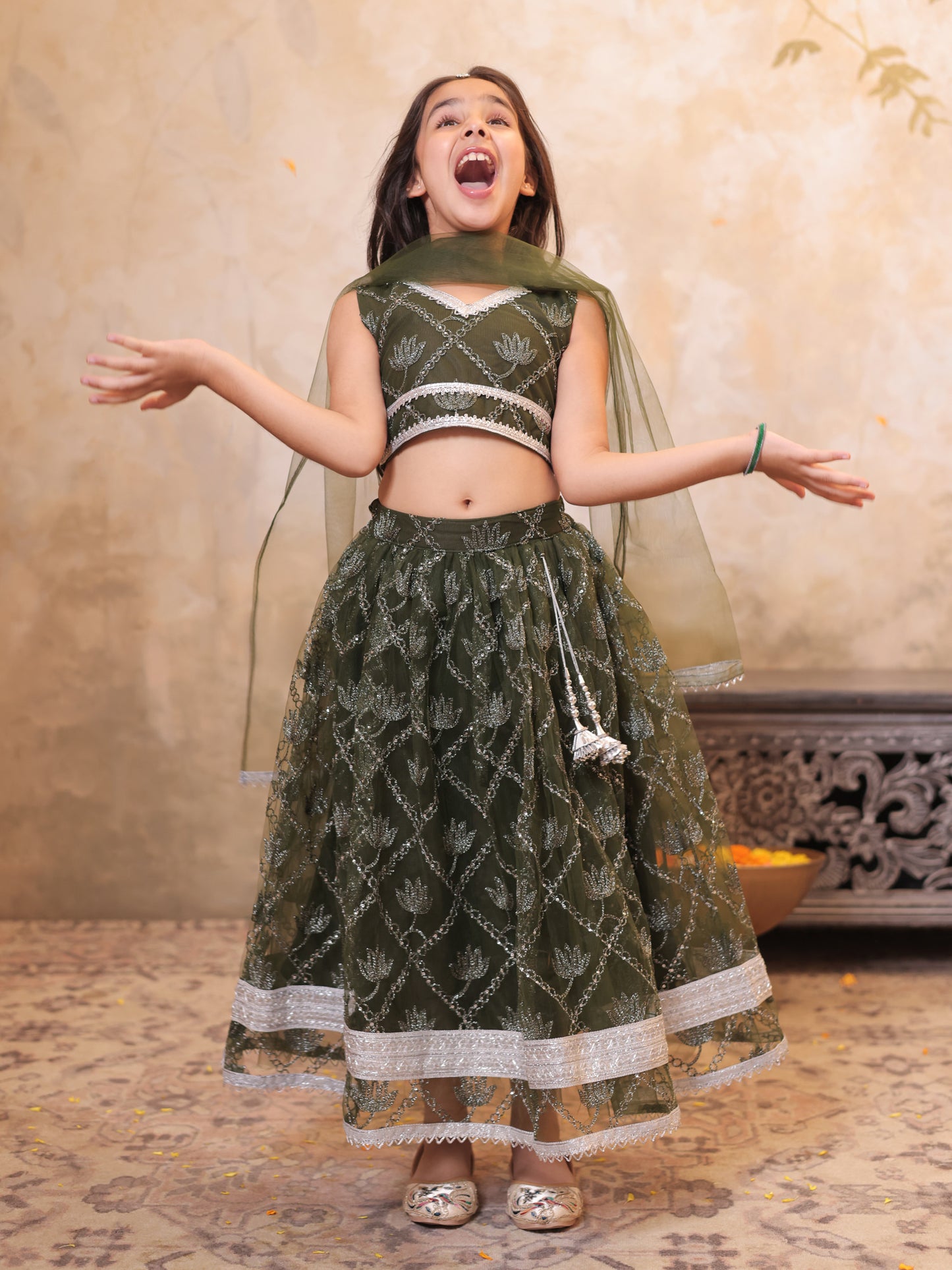 Girls Green Net Sleeveless Heavy Embroidered Lehenga Choli