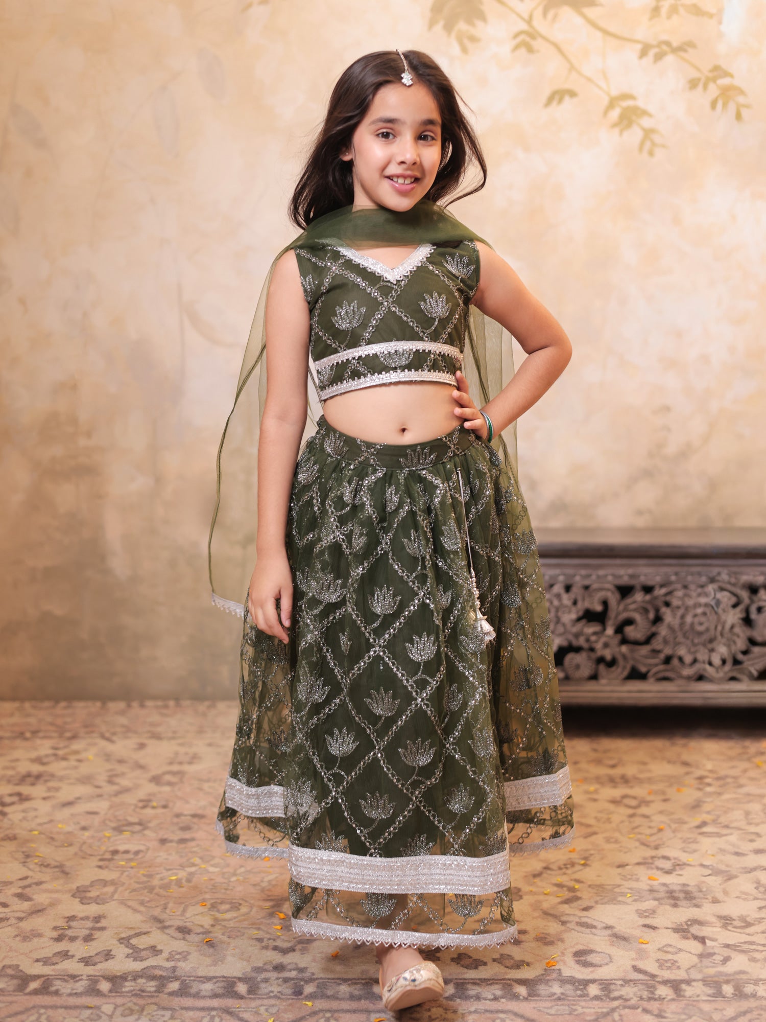 Girls Green Net Sleeveless Heavy Embroidered Lehenga Choli