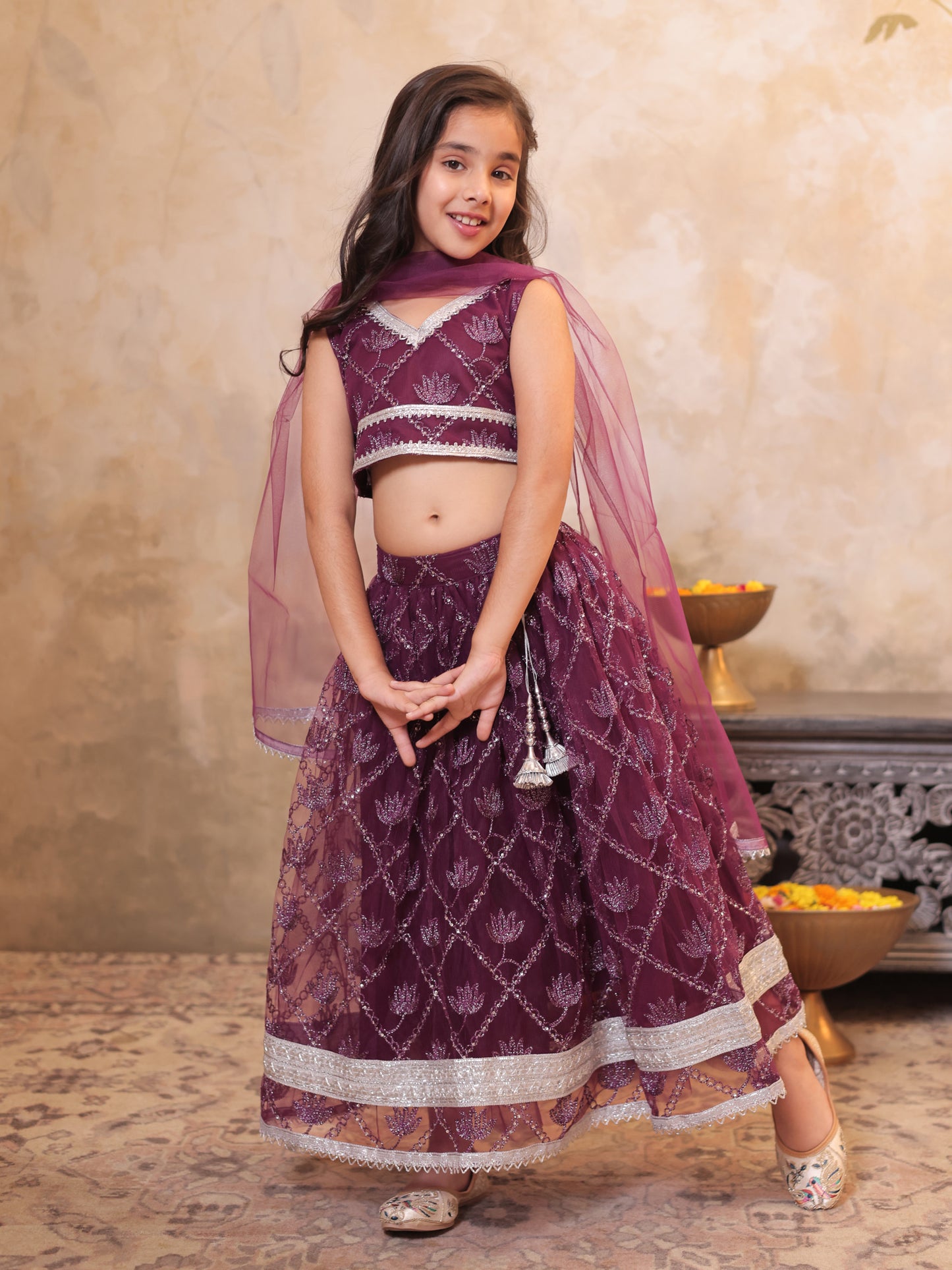 Girls Wine Net Sleeveless Heavy Embroidered Lehenga Choli
