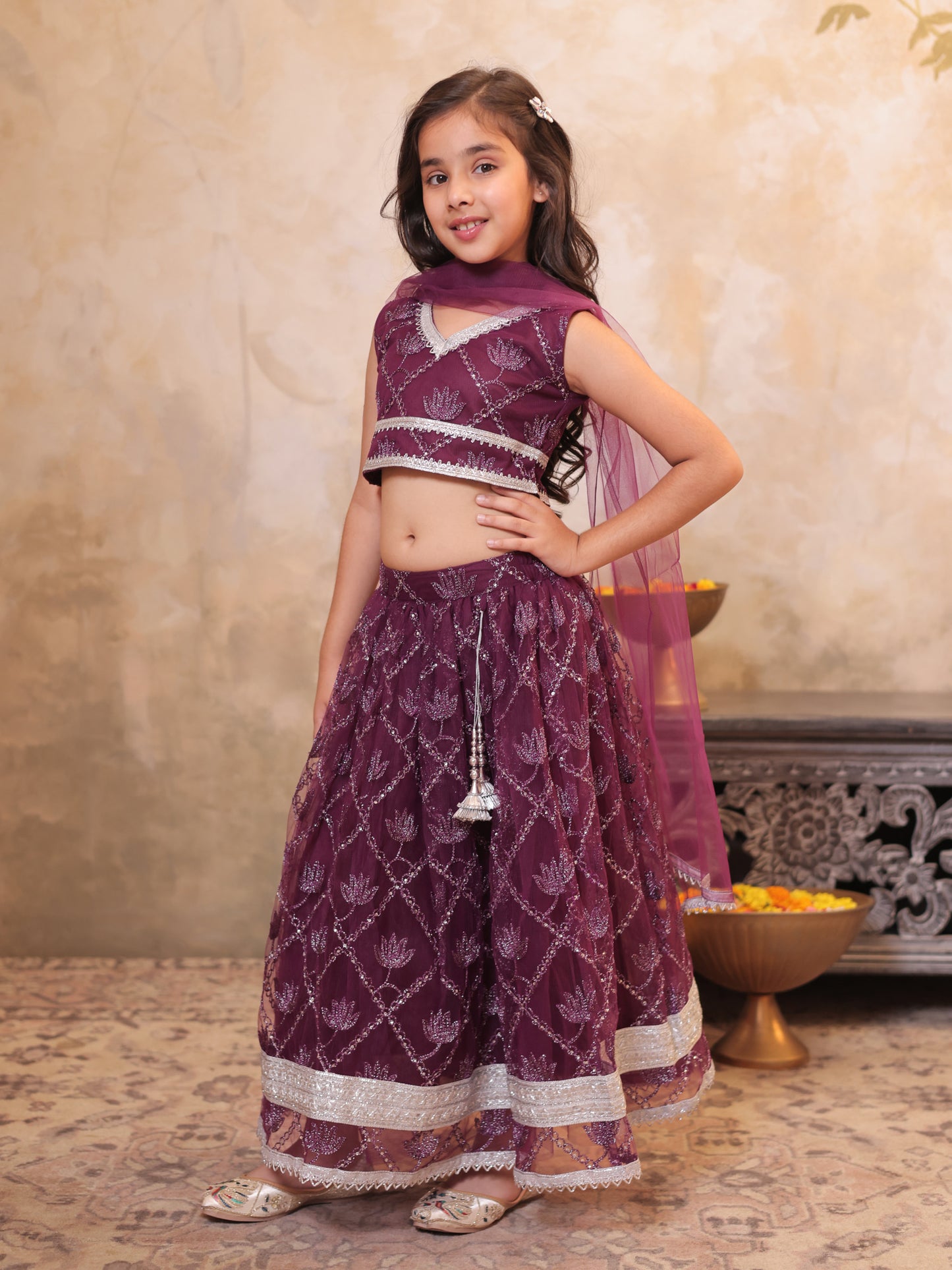 Girls Wine Net Sleeveless Heavy Embroidered Lehenga Choli