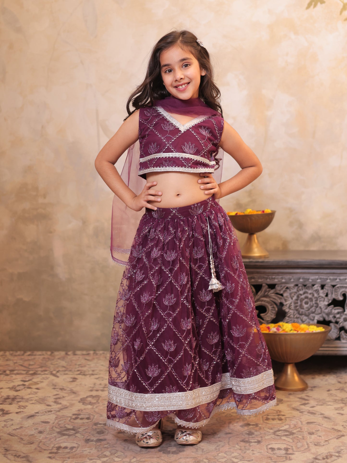 Girls Wine Net Sleeveless Heavy Embroidered Lehenga Choli