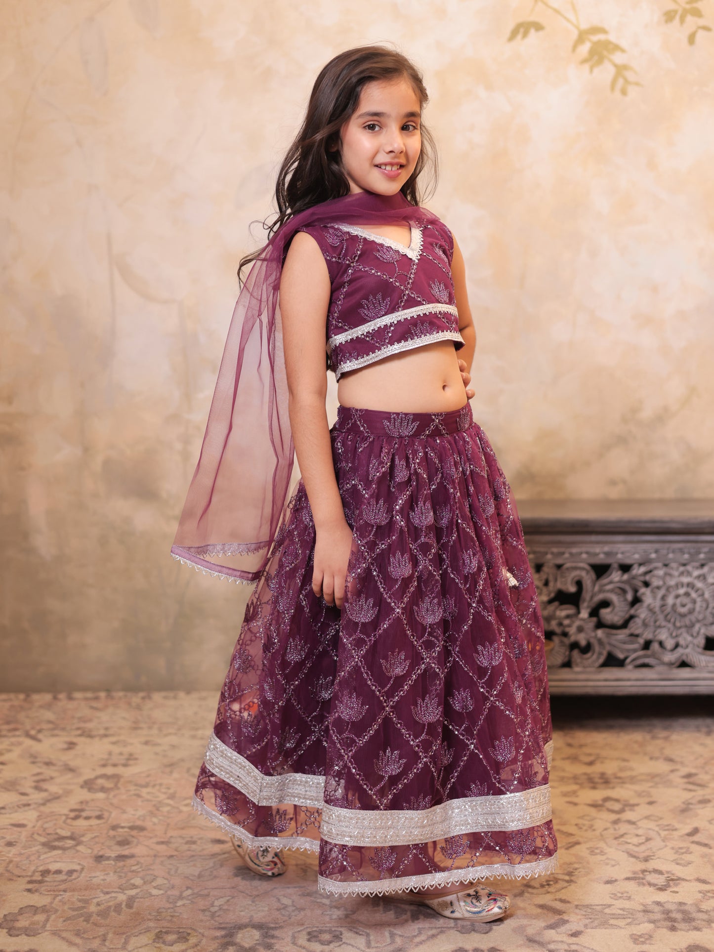 Girls Wine Net Sleeveless Heavy Embroidered Lehenga Choli