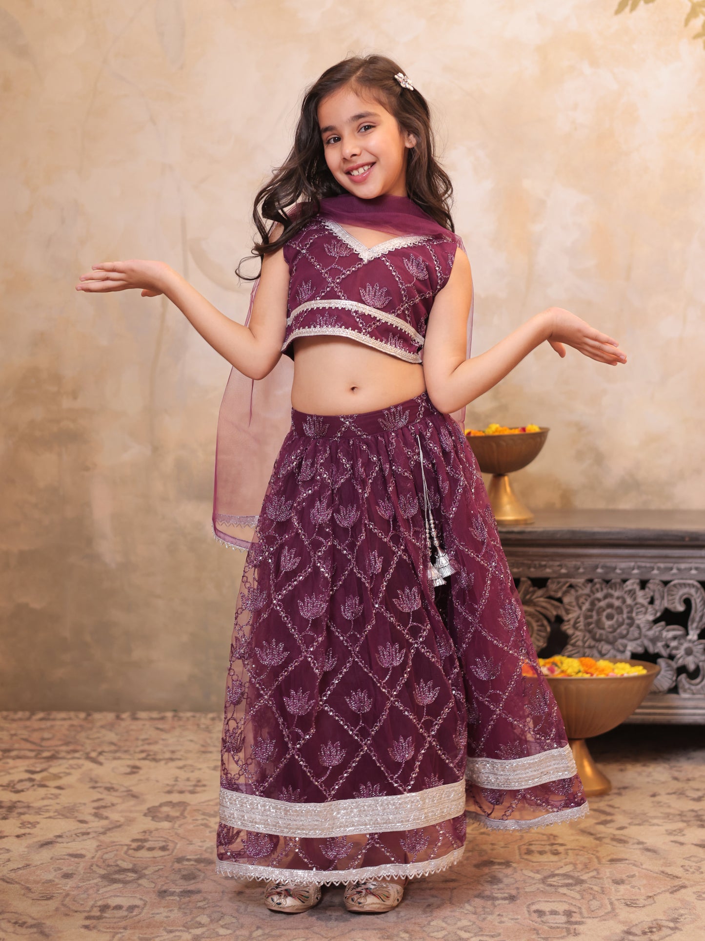 Girls Wine Net Sleeveless Heavy Embroidered Lehenga Choli