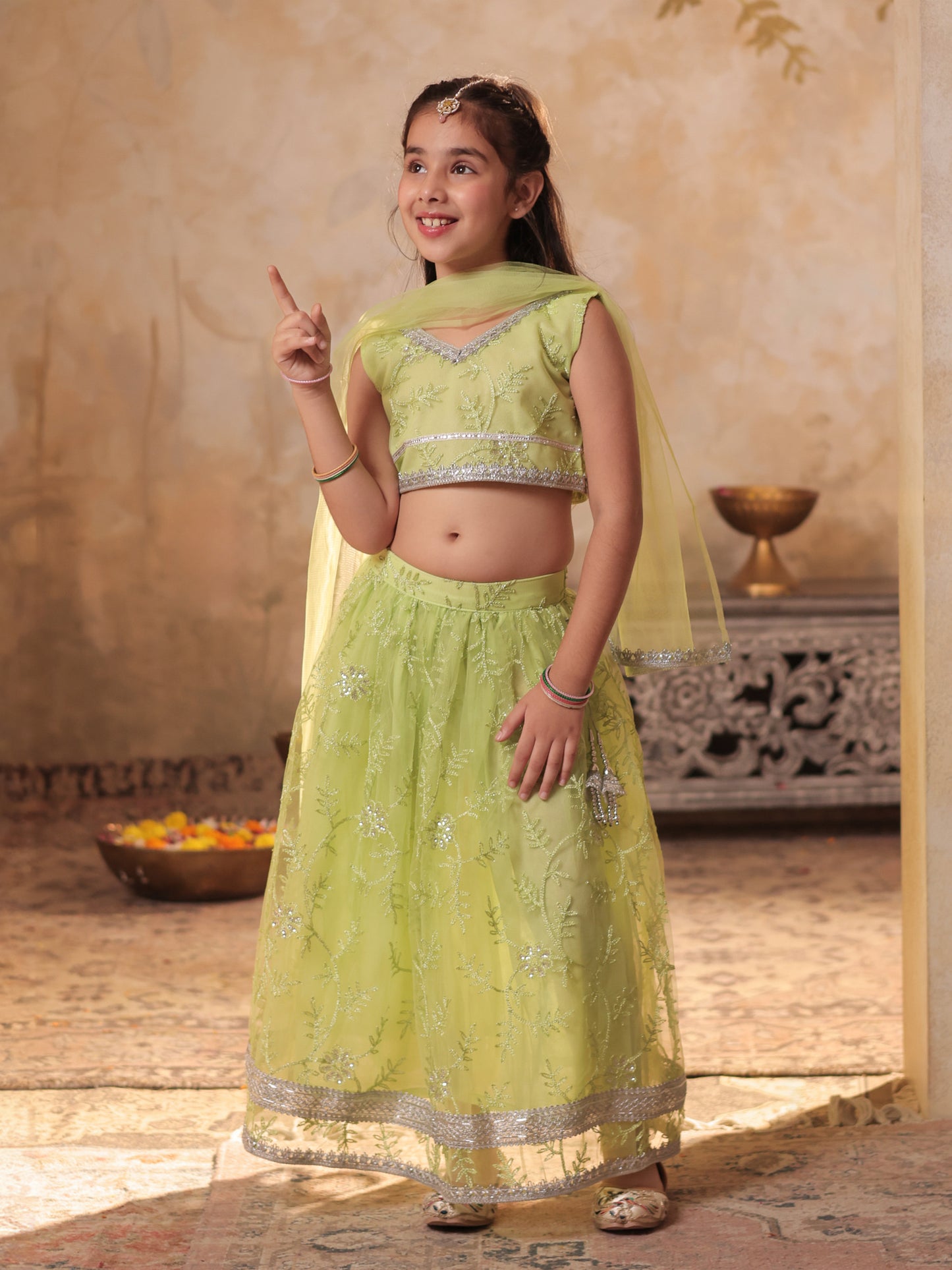 Girls Lime Green Net Sleeveless Heavy Embroidered Lehenga Choli