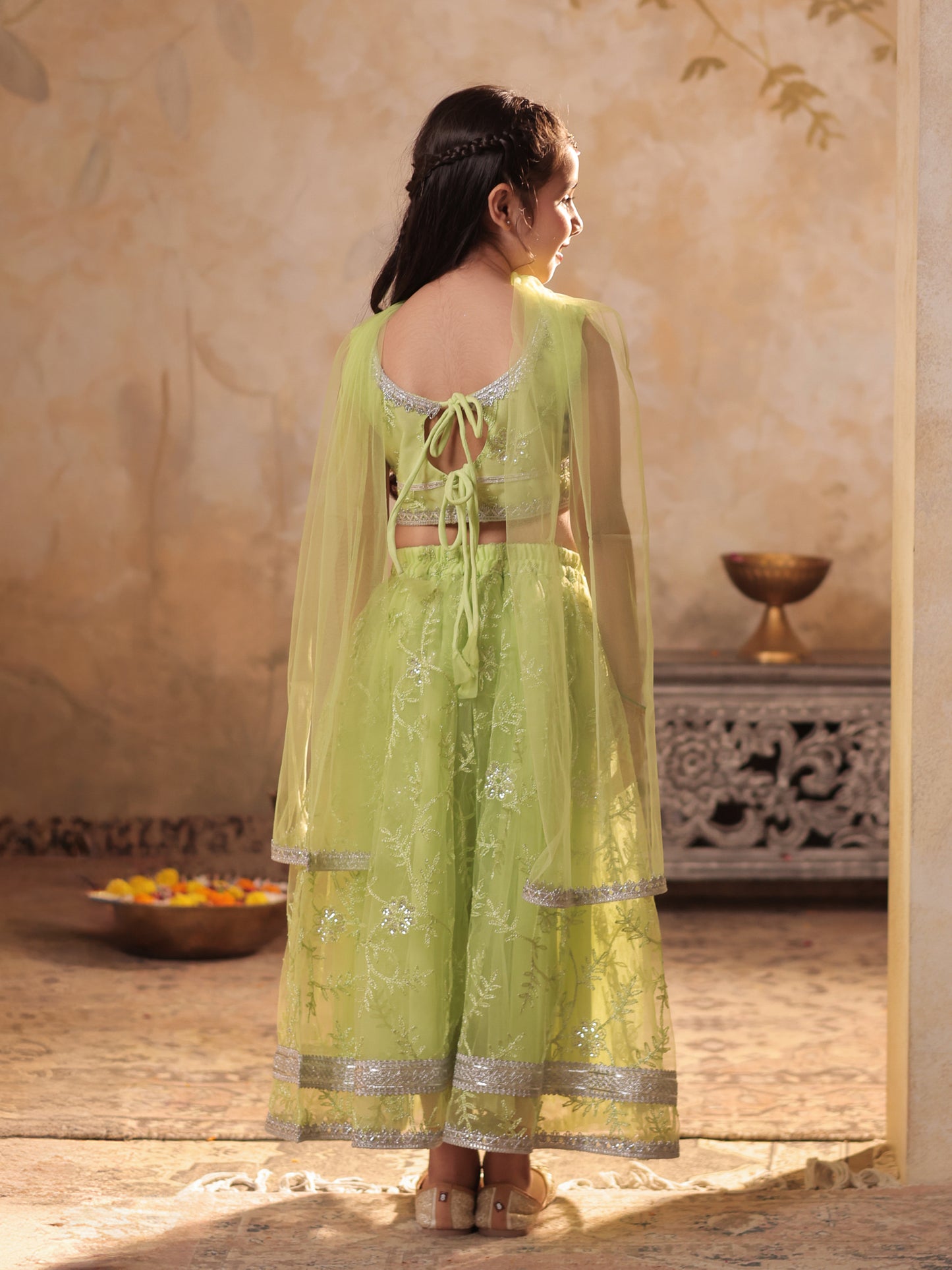 Girls Lime Green Net Sleeveless Heavy Embroidered Lehenga Choli