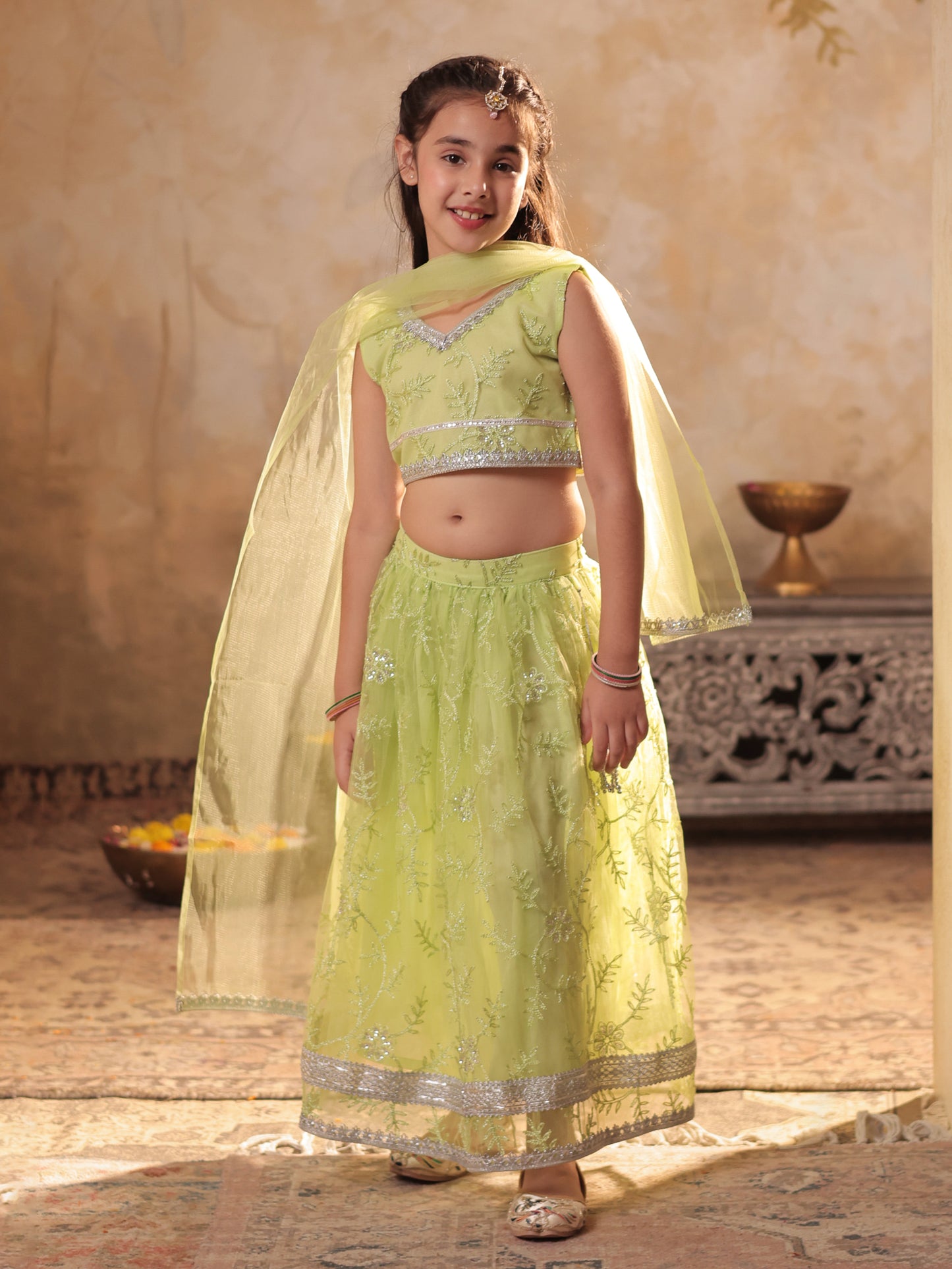 Girls Lime Green Net Sleeveless Heavy Embroidered Lehenga Choli