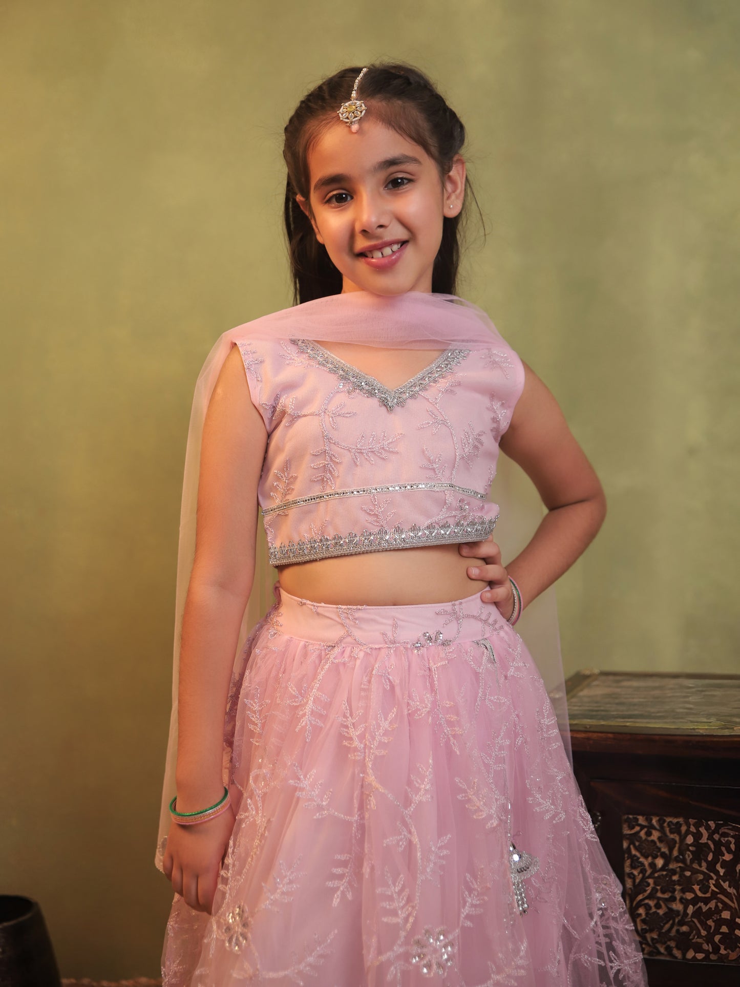 Girls Baby Pink Net Sleeveless Heavy Embroidered Lehenga Choli