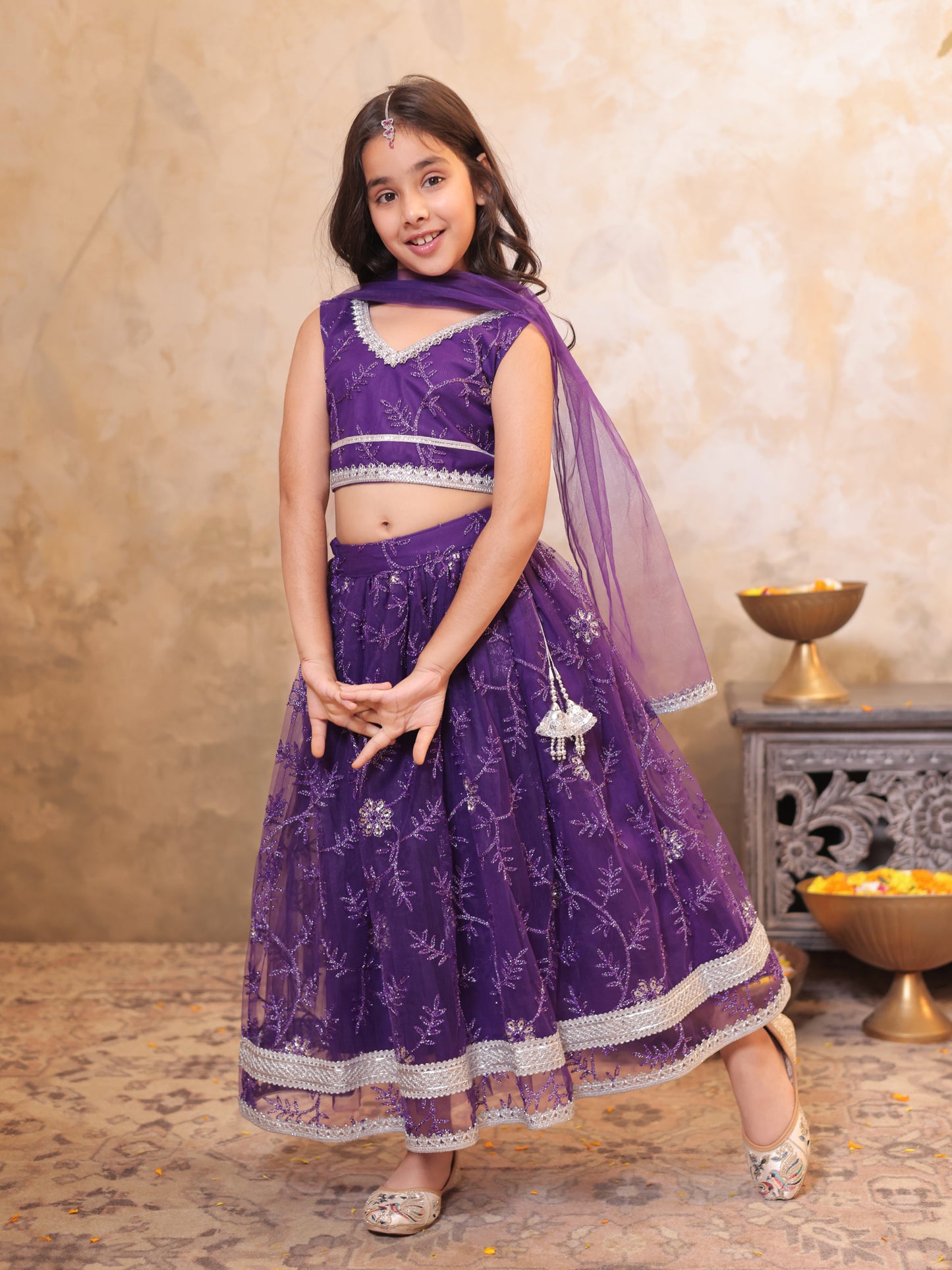 Girls Purple Net Sleeveless Heavy Embroidered Lehenga Choli