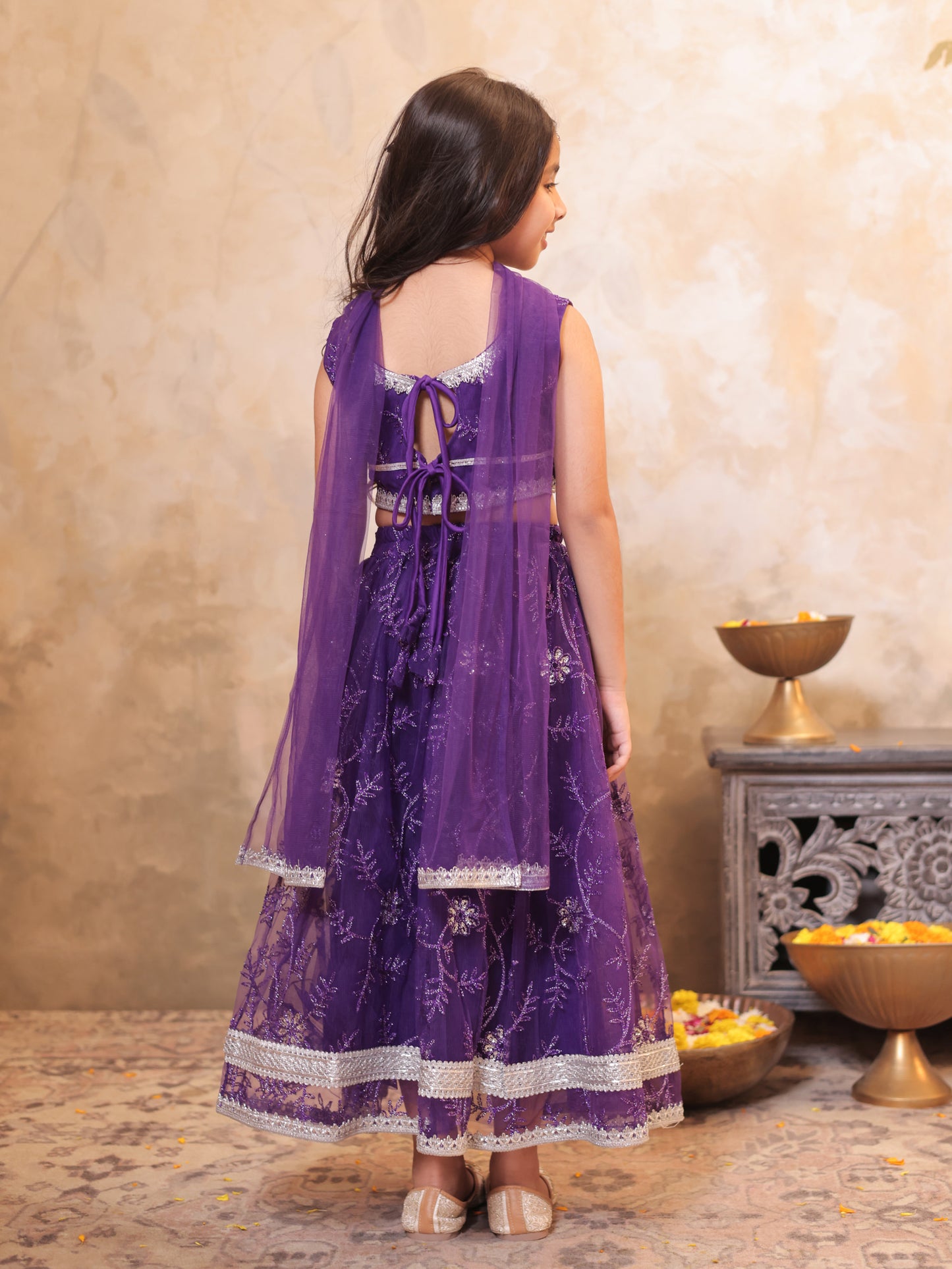 Girls Purple Net Sleeveless Heavy Embroidered Lehenga Choli