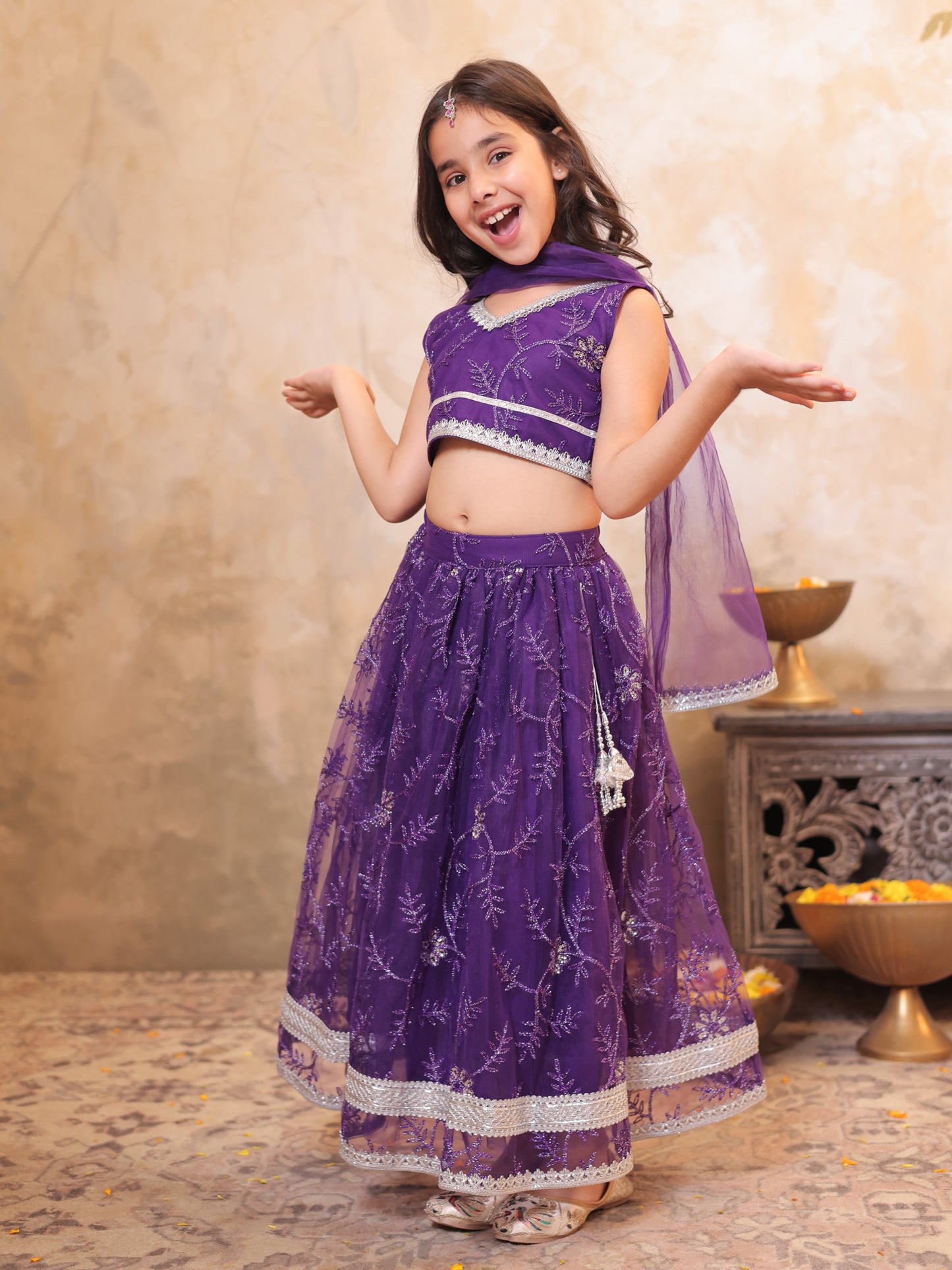 Girls Purple Net Sleeveless Heavy Embroidered Lehenga Choli
