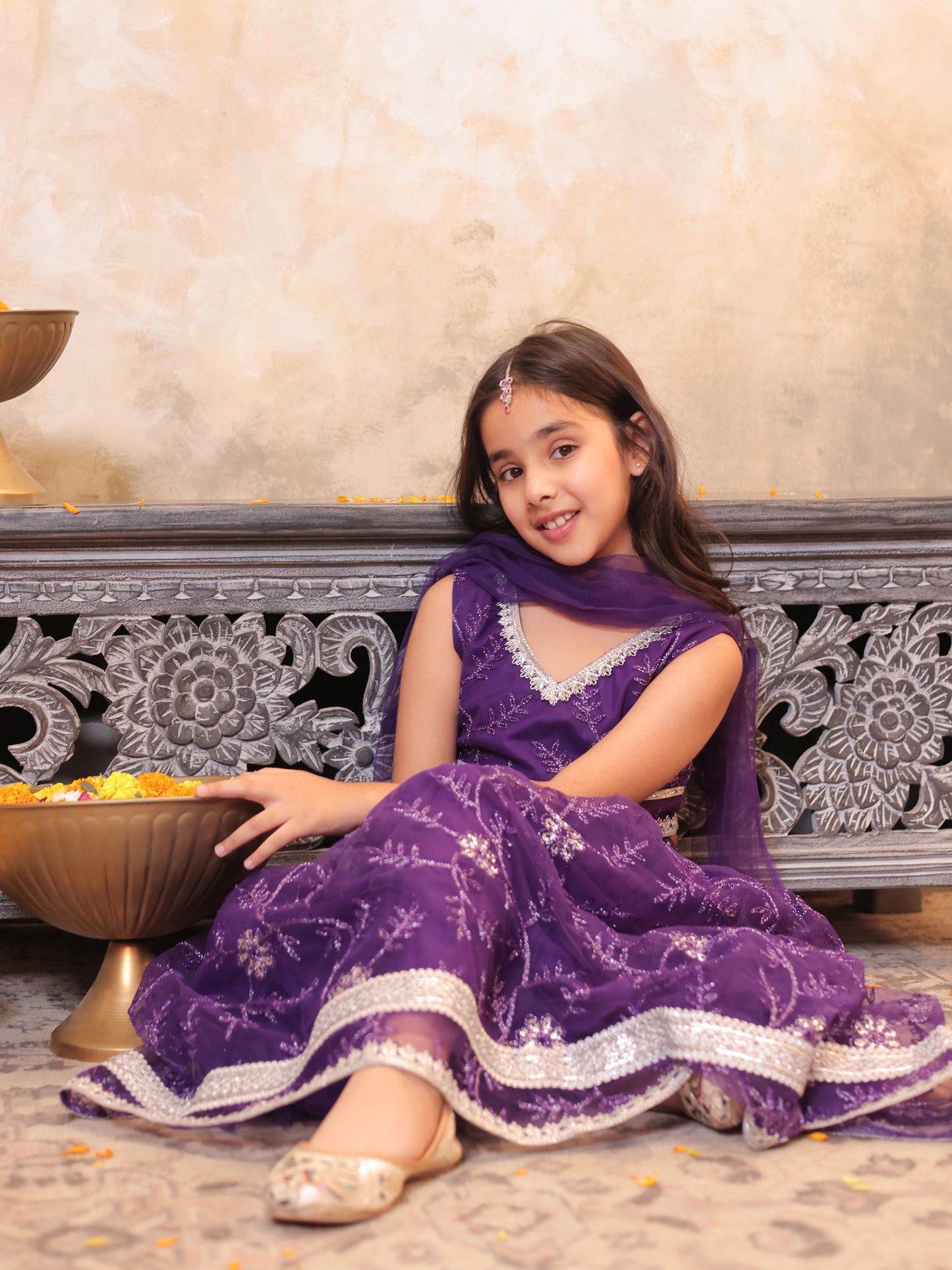 Girls Purple Net Sleeveless Heavy Embroidered Lehenga Choli