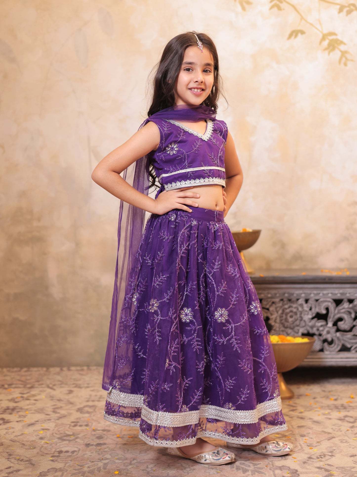 Girls Purple Net Sleeveless Heavy Embroidered Lehenga Choli