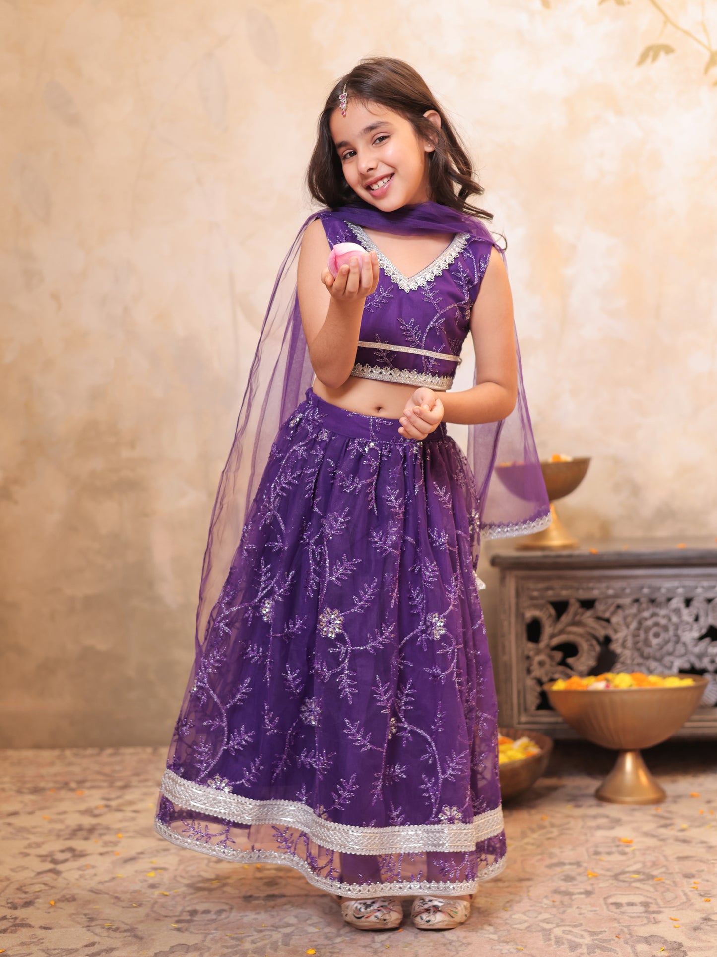 Girls Purple Net Sleeveless Heavy Embroidered Lehenga Choli